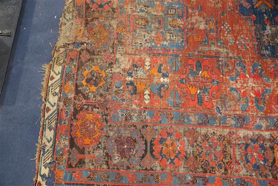A Soumak red ground carpet, 12ft 2in 10 ft.